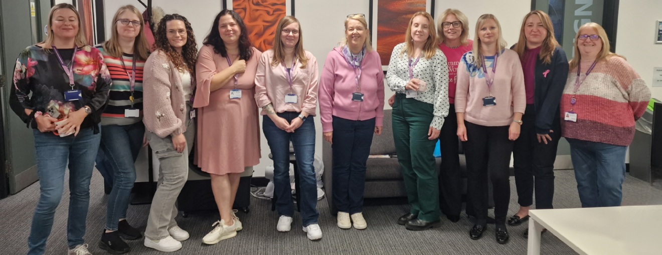 Procurement services team wearing pink supporting breast cancer