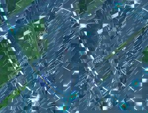 Aerial view of a motorway interchange, overlaid with glowing digital network lines