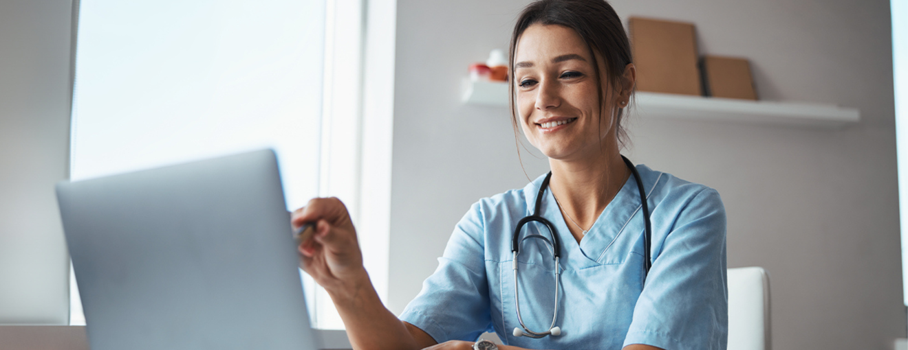  A person looking at their laptop