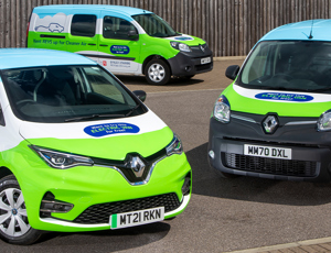 Three branded Renault vehicles in a car park