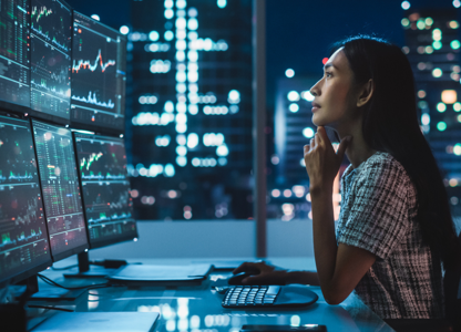 A person in an office using technology