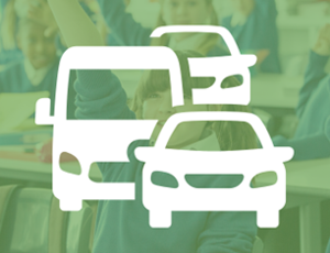 children in a classroom with a vehicle graphic