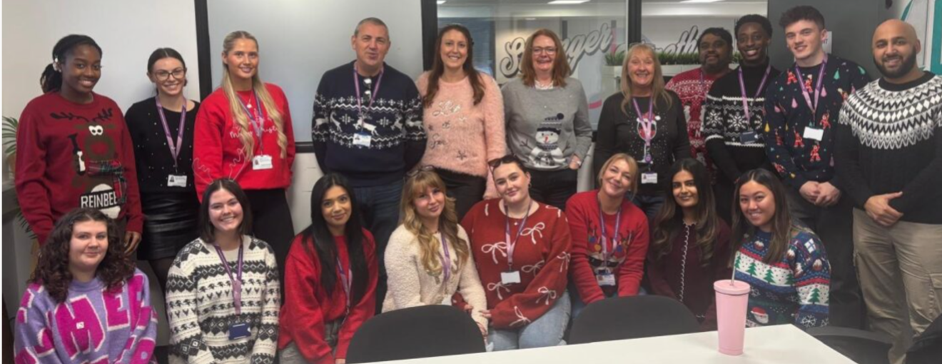 procurement services team wearing festive jumpers