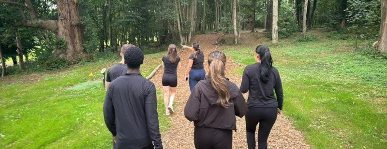 Procurement services team outside volunteering